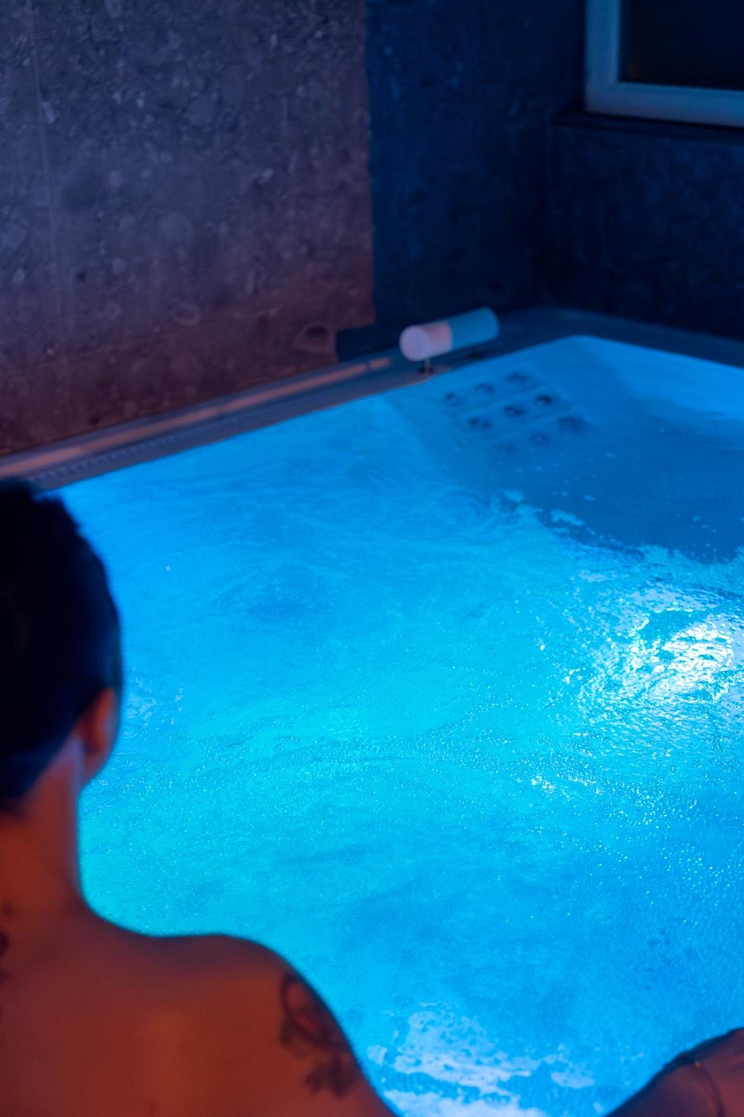 The whirlpool tub with blue lighting